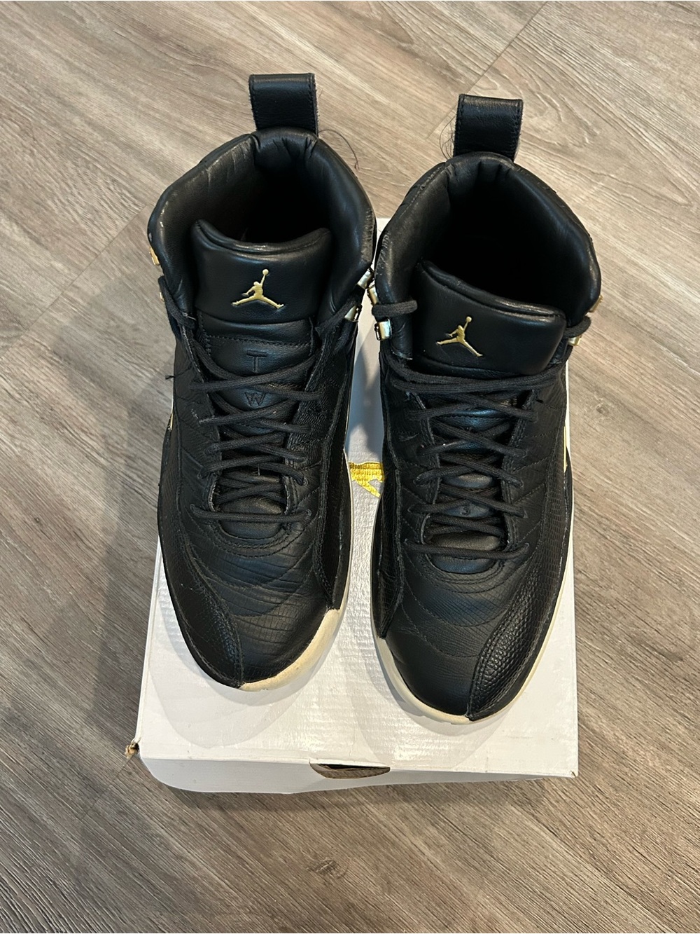 Jordan Men's Black Leather High-Top Sneakers with Gold Accents